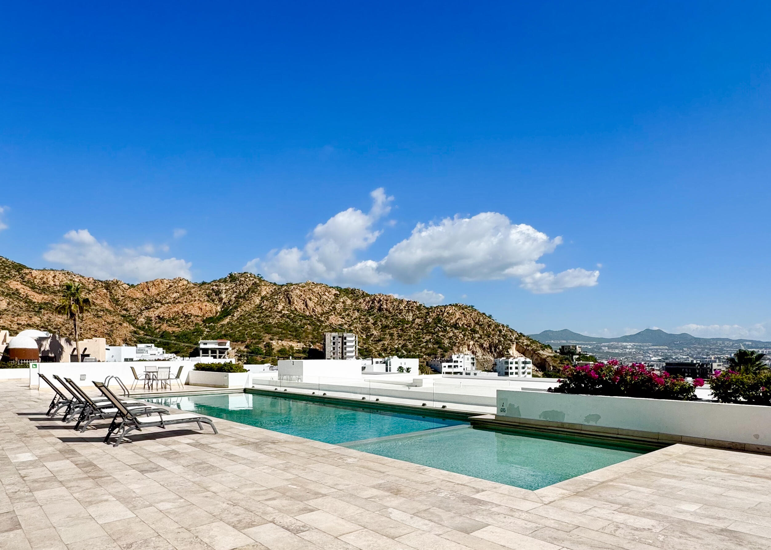 Los Cabos Amaterra Corner unit- Amaterra 304 D - is ideally located just 350 meters from Medano Beach, within the Amaterra Phase 2 building. This condo features 2 bedrooms and 2 full bathrooms, and is offered fully furnished and equipped, with one assigned parking space.It's a great option whether you're looking for a comfortable place to live or a property with rental potential. Residents enjoy access to a shared rooftop with a pool and beautiful for sale