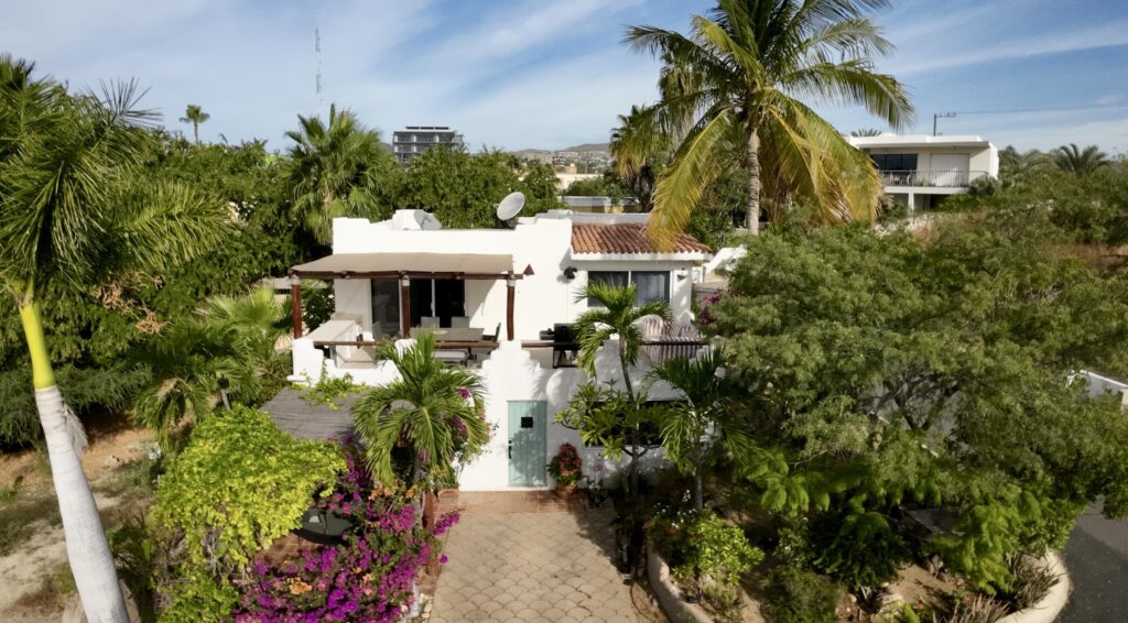 Los Cabos Cabo Bello Located in the desirable gated community of Cabo Bello, this duplex residence offers flexibility, privacy, and excellent income potential. Designed as two fully independent living spaces, the property features a total of five bedrooms, two kitchens, and two BBQ areas, ideal for large families or owners seeking to live in one unit while renting the other.One of Cabo Bello's standout features is its swimmable beach, one of the best in the Tezal area, just minutes away. Known for its security and peaceful atmosphere, the community offers gated access and 24/7 surveillance.Conveniently located near Fresko, Costco, Home Depot, and some of Cabo San Lucas' top restaurants, this property is perfect as a full-time residence, vacation home, or smart investment opportunity. for sale