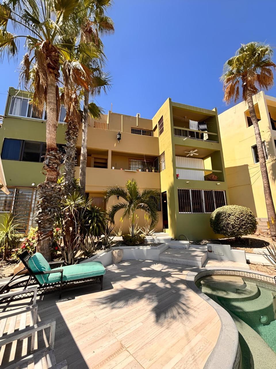 Los Cabos Bahia Del Tezal Located in the desirable ocean side area of Cabo San Lucas, within Bahía del Tezal, this bright and well-maintained 2-bedroom, 2-bathroom condo offers one of the best value opportunities in Cabo. The unit features a functional open layout with great natural light, a clean and inviting living space, and move-in ready condition. Ideal for full-time living, a vacation getaway, or a rental investment. Just minutes to Medano Beach and close to shopping, dining, and grocery stores. A great opportunity for savvy buyers seeking rental income potential and strong value. The building offers a rooftop common area with pool, lounge area, and ocean, city, and mountain for sale