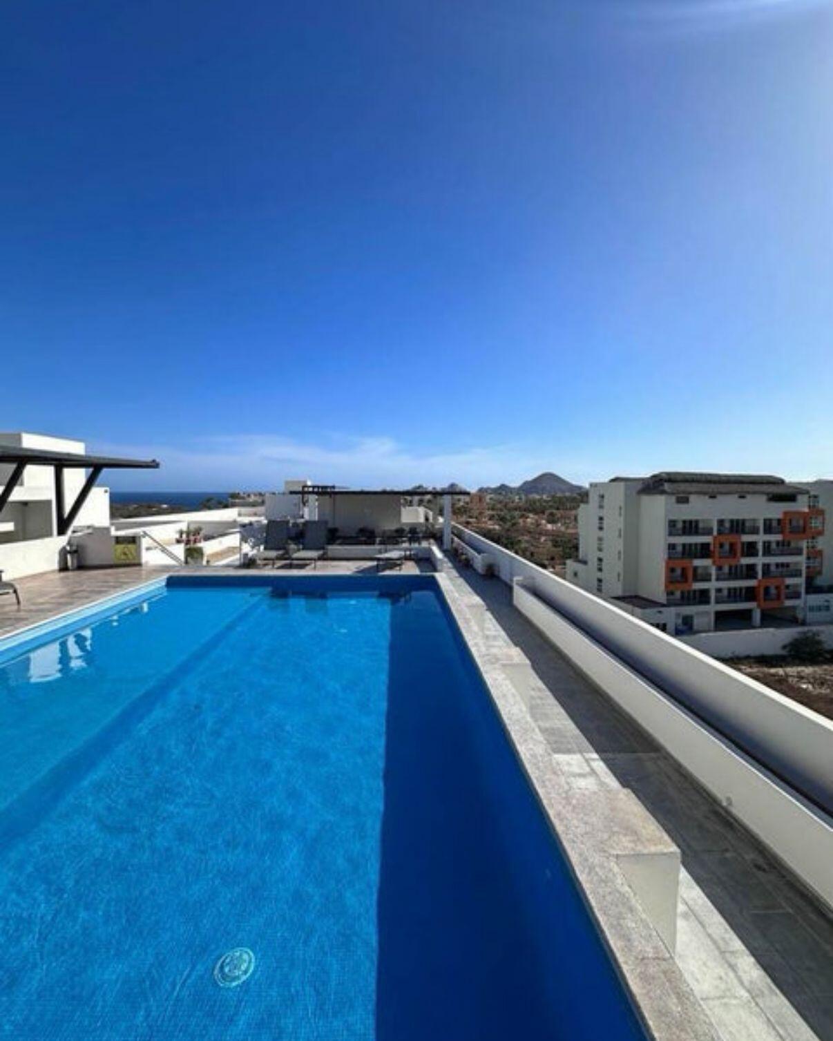 Los Cabos Vista Vela Sunset Penthouse fully furnished and turnkey, located in VistaVela Sunset. This PH features spacious interiors, an open-concept living and dining area, and a fully equipped kitchen with appliances included. The unit comes completely furnished, ready to move in or start generating rental income immediately.The highlight of the property is its oversized private rooftop terrace, offering ample space to design and create any concept you envision -- from a lounge area, outdoor kitchen, jacuzzi, or entertainment space. Ideal for those looking to customize their outdoor living experience and maximize the Cabo lifestyle.Amenities:6 swimming poolsFully equipped fitness centerClubhousePadel and pickleball courtsLandscaped gardens and green areasPutting green24/7 gated security for sale