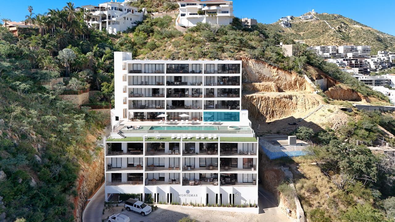 Los Cabos Three Point Tower Experience elevated living in this one-of-a-kind turnkey penthouse in downtown Cabo--only 3 penthouse condos in the building. Fully furnished 2BD/2.5BA with designer finishes, two oversized closets, and two secured garage spots behind a mechanic gate and secured entry door. Built in 2023, this stylish retreat offers peace of mind and comfort. Enjoy panoramic bay and city for sale