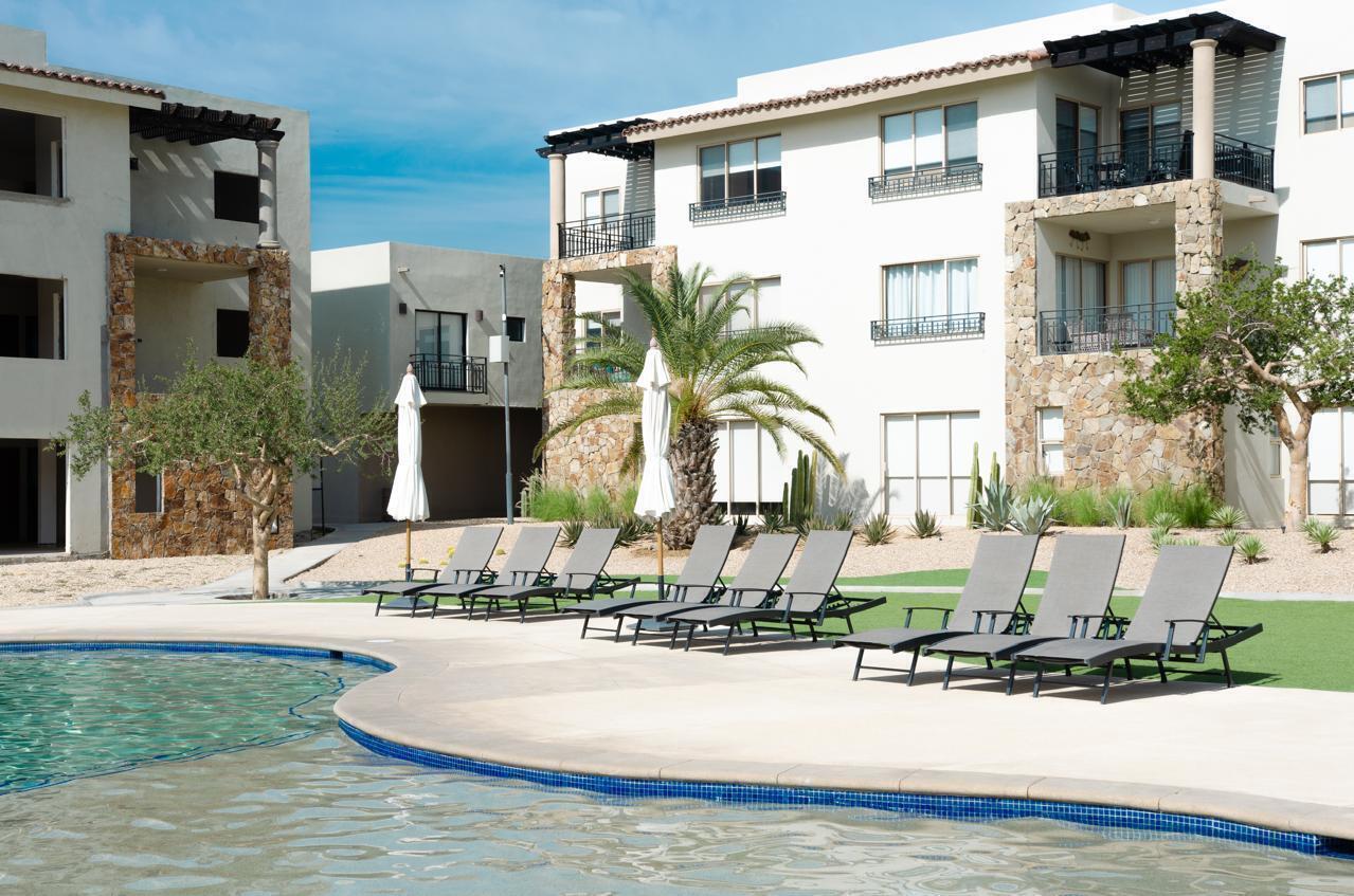 Los Cabos Camino Del Mar Condo for sale in Camino del Mar, La Joya, Cabo San Lucas. This 2-bedroom, 2-bathroom condo is located on the ground level, offering easy access and comfortable living. The unit features a private terrace with a pleasant for sale