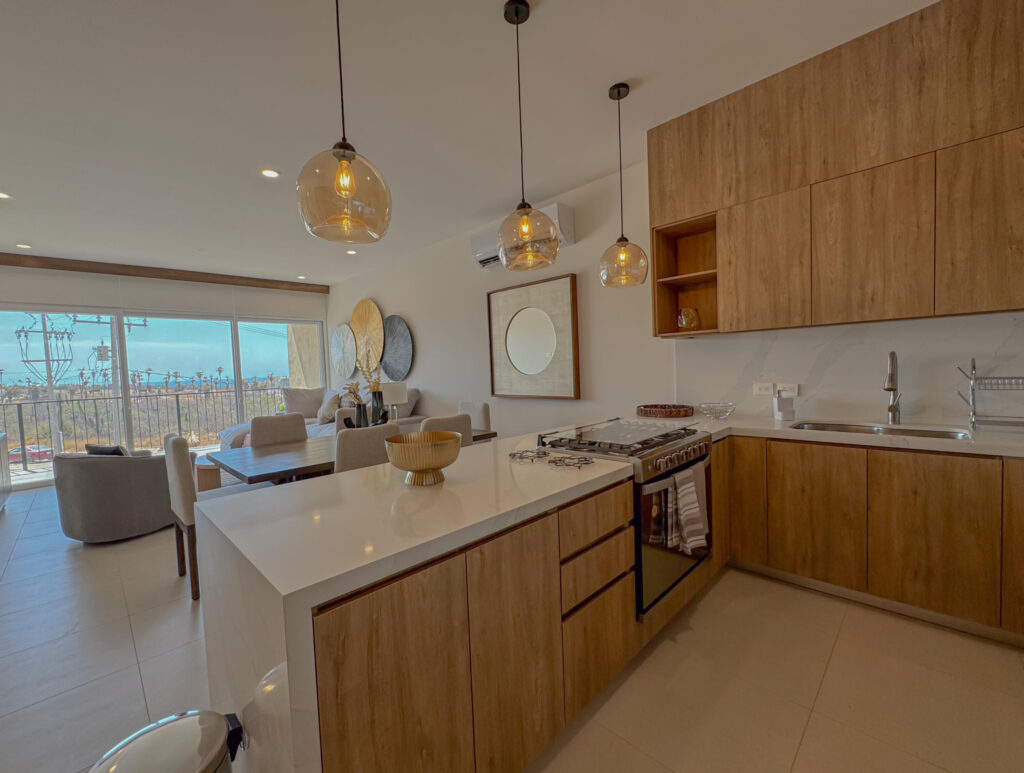 Los Cabos Veranda Residences Imagine a boutique community experience with resort amenities VERANDA offers you 18 condo units. 2 towers of 9 units each; three per level. 2 and 3 Bedroom layouts, with double height ceilings. Upscale finishes including: Marble floorings, Granite countertops, Solid wood carpentry in kitchen, doors, closets and bathroom cabinetries. Pocket door.Appliances included: microwave, 6-burner gas range, oven, dishwasher, sink with faucet, water heater and AC mini splits in bedrooms and living space. Garden Level units with Private Patio. Penthouses have Private Rooftop Terrace, including Marble flooring, Grill, Bar, Pergola and Half Bathroom.Community amenities: pool and jacuzzi, guest bathrooms, grill and bar, picnic area, kids area, gym, elevators, guests parking. – Condo Cuatrovientos, Cabo Corridor, Cabo Corridor, BS
