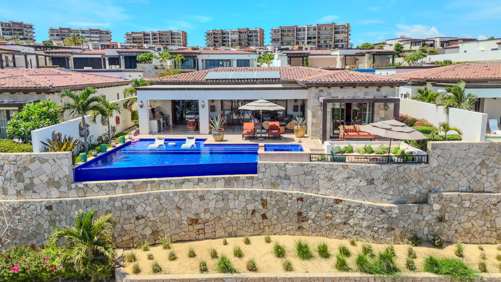 Los Cabos West Enclave Ritz-Carlton Residence 6 at The Residences at Zadún, Ritz-Carlton Reserve, This Villa is 50% complete offering a faster move in timeframe. Offers the privacy of a single-family home within Puerto Los Cabos. This 5-bedroom, 5-bath + 2 half-bath villa spans 998 m² (10,745 sq ft) of refined indoor-outdoor living with a private pool, Jacuzzi, fire pit, and BBQ terrace. Finishes include marble, oak millwork, and Sub-Zero/Wolf appliances. Owners enjoy Ritz-Carlton Reserve services, Sensei Spa, Beach Club, and membership in Club Puerto Los Cabos golf and social amenities. Villa comes fully furnished with the Ritz-Carlton Reserve approved package. – Coronado 4.6, Pacific, BS