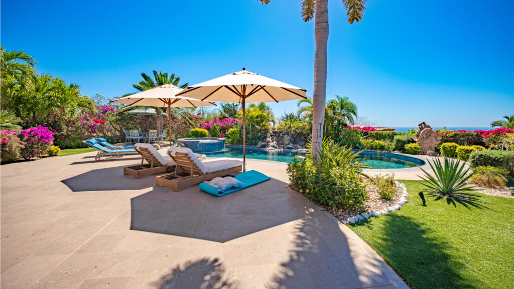 Los Cabos Cumbre Del Tezal Luxury finishes include marble flooring, wood kitchen with granite countertops, built-in wooden closets in all bedrooms, and vanities with tempered glass shower doors in all 3.5 baths. Fully equipped with 5 Gree inverter mini-split A/C units (3 × 1-ton, 2 × 2-ton), LG 22' French Door refrigerator, Whirlpool gas stove, and 1.7 cu ft microwave hood. Additional features: rooftop with bar, grill & sink, private terrace, storage, WiFi smart lock, private 5,000-liter cistern, and termite prevention system. Community: pool, gym, sports courts, kids' area, 3 clubhouses & 24/7 gated security – Cresta Del Mar, Cabo Corridor, BS