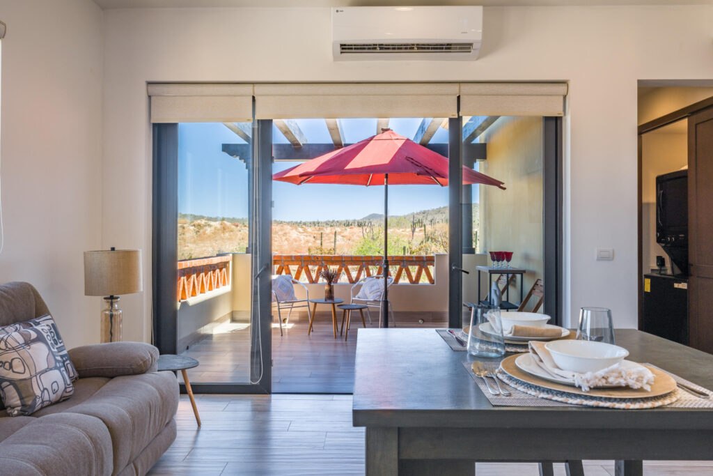 Los Cabos Dunes Residence Club Enjoy resort-style living with this 3-bedroom corner ground-floor residence at The Palmilla Dunes. This contemporary-style condo is offered fully furnished and turn-key, blending modern design with warm finishes, including travertine floors, parota wood furnishings, and GE Profile appliances. The ''Palm Garden Residence'' layout features a primary bedroom with a king bed and private terrace, plus two back bedrooms, one with two double beds and one with a king, making it ideal for family and guests. Indoor-outdoor living is seamless with pocket doors, a covered exterior terrace, and BBQ area, complemented by a private putting green perfect for fun and entertaining. An oversized one-car garage is located directly in front of the unit, and a luxury six-seater golf cart is included for convenient access to Palmilla's shopping centers, restaurants, and swimmable beach.Whether you're looking for a private vacation retreat or an investment rental, this property offers a ready-to-enjoy lifestyle, with optional access to The Dunes Club amenities, including tennis, pickleball, and paddle courts, gym and spa, semi-Olympic pool, jacuzzi, movie theater, sports bar, and clubhouse. – Financing Optional, Pacific, BS