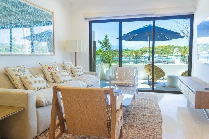 Los Cabos Camino Viejo Condominiums PRICE IMPROVEMENT!!!! Discover over 1,500 sq ft of modern, light-filled living just a 10-minute stroll from Medano Beach. This oceanside 2 bed/2 bath unit features high ceilings, quality finishes, and large wrap-around balcony perfect for indoor/outdoor living. Building amenities include underground parking with electrical outlet for your EV, elevator, storage unit, and security guard. Building is wheelchair accessible. Also included is a rooftop heated ocean- for sale