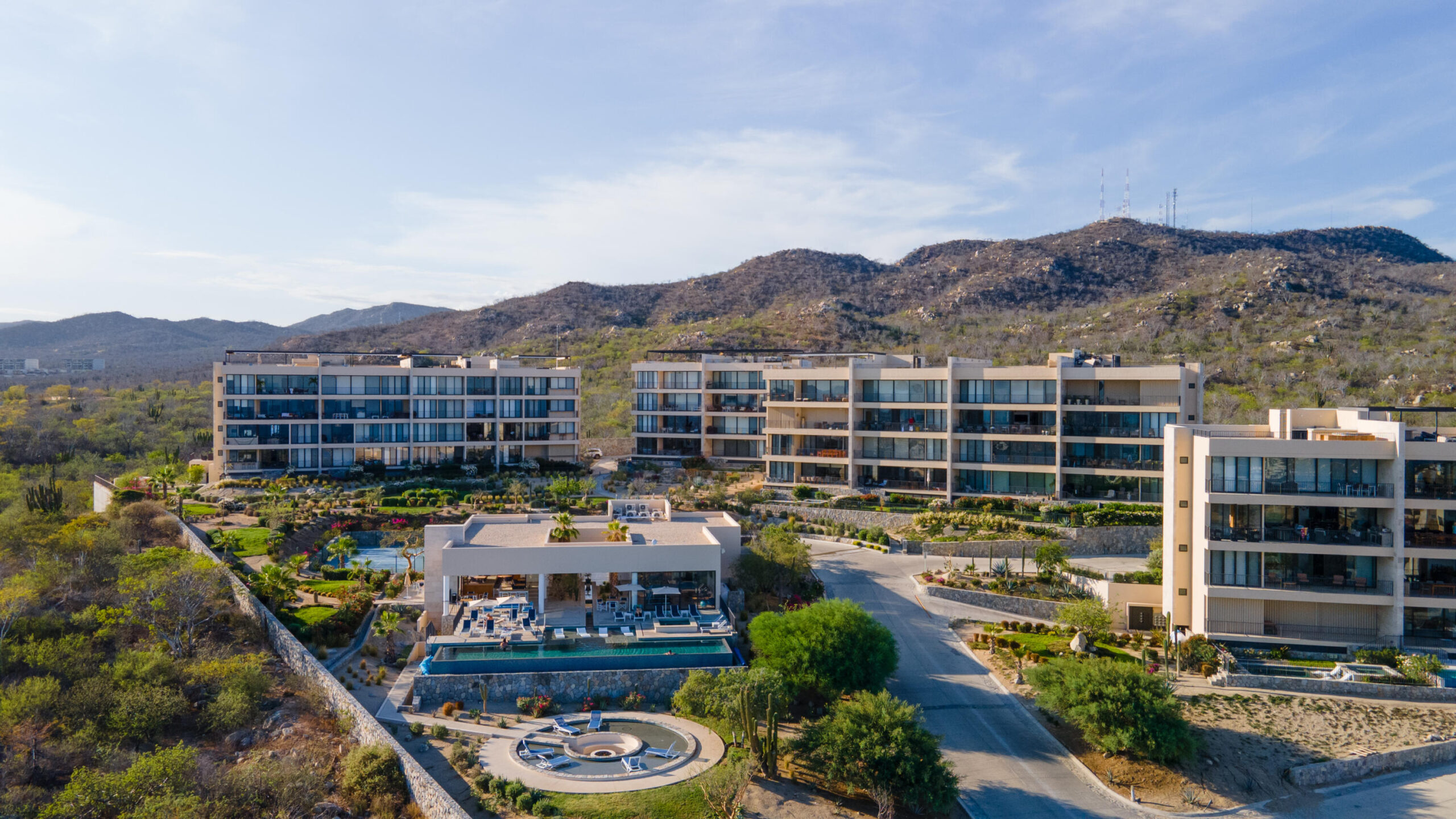 Los Cabos Dunes Residence Club Enjoy resort-style living with this 3-bedroom corner ground-floor residence at The Palmilla Dunes. This contemporary-style condo is offered fully furnished and turn-key, blending modern design with warm finishes, including travertine floors, parota wood furnishings, and GE Profile appliances. The ''Palm Garden Residence'' layout features a primary bedroom with a king bed and private terrace, plus two back bedrooms, one with two double beds and one with a king, making it ideal for family and guests. Indoor-outdoor living is seamless with pocket doors, a covered exterior terrace, and BBQ area, complemented by a private putting green perfect for fun and entertaining. An oversized one-car garage is located directly in front of the unit, and a luxury six-seater golf cart is included for convenient access to Palmilla's shopping centers, restaurants, and swimmable beach.Whether you're looking for a private vacation retreat or an investment rental, this property offers a ready-to-enjoy lifestyle, with optional access to The Dunes Club amenities, including tennis, pickleball, and paddle courts, gym and spa, semi-Olympic pool, jacuzzi, movie theater, sports bar, and clubhouse. for sale