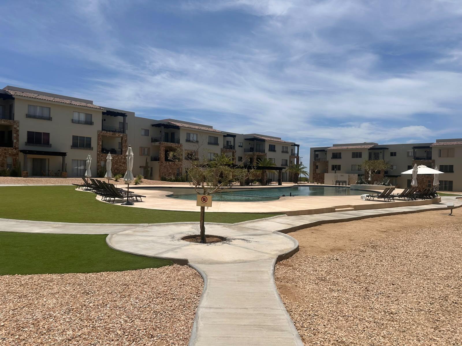 Los Cabos Camino Del Mar Ground-Floor Condo | La Joya at Camino del Mar, El TezalDiscover the perfect blend of comfort, convenience, and investment potential in this beautiful ground-floor condominium located in the highly sought-after La Joya Residences, within the master-planned community of Camino del Mar in El Tezal, one of Los Cabos' fastest-growing and highest-appreciating neighborhoods.This thoughtfully designed residence features:* 2 spaci ous bedrooms* 2 full bathrooms* TV / Family Room* Ground-floor location with direct access to the pool* Swimming pool right in front of your terraceResidents also enjoy exclusive resort-style amenities, including:✔️ Semi-Olympic swimming pool✔️ Fully equipped fitness center✔️ Kids' Park✔ – Maldivas, Cabo Corridor, BS