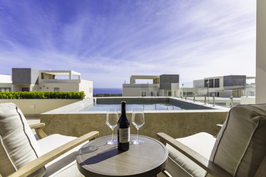 Los Cabos Cabo Costa Welcome to Cabo Costa, one of Cabo San Lucas' newest residential communities, where modern architecture meets the natural beauty of Baja. This beautifully appointed ground-floor residence features two spacious en-suite bedrooms, a private terrace, and a dipping pool. Finished in warm, neutral tones, the home offers a timeless design that is both elegant and inviting. Residents enjoy resort-style amenities including a clubhouse, infinity pool, fitness center, sundeck, and business space. Contact me today for more information or to schedule a private tour. – Via La Paloma, Cabo Corridor, BS